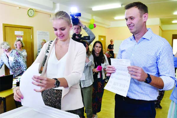 Russian opposition activist Alexei Navalny, who voted alongside his daughter Daria, said his call for "smart voting" had dealt a blow to the pro-Kremlin candidates.