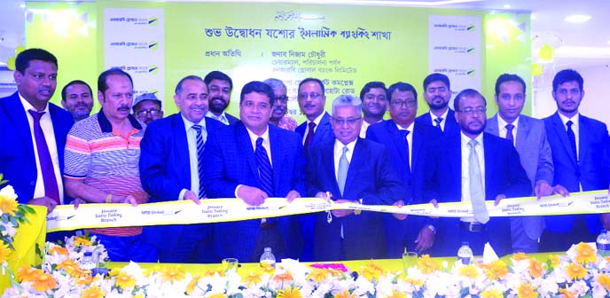 Nizam Chowdhury, Chairman of NRB Global Bank Limited, inagurating its Islami Banking Branch at Jashore on Wednesday. Independent Director Dr. Md. Nizamul Hoque Bhuiyan, Managing Director Syed Habib Hasnat, AMD Md. Mostafizur Rahman Siddiquee, and local el