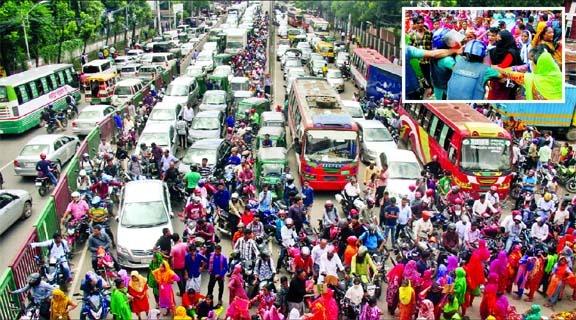 Police charge batons to disperse the Nasa Garment workers (inset) as they stage demonstration on the road road at Tejgaon area, demanding arrears and allowances, creating huge traffic gridlock on Thursday.