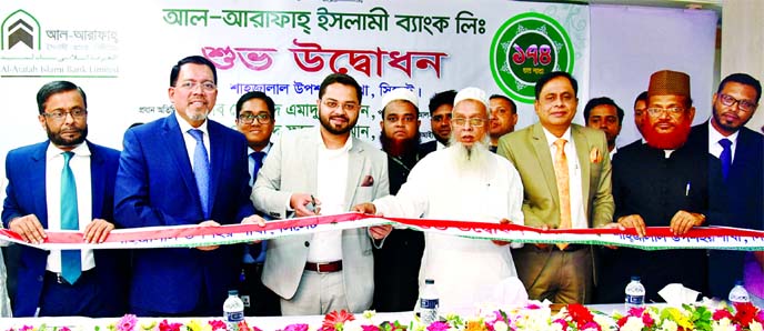 Mohammad Emadur Rahman, Director of Al-Arafah Islami Bank Limited, inaugurating its 174th branch at Shahjalal Uposhahar in Sylhet on Thursday. Oliur Rahman-Vice Chairman of Al-Haramain Group, Kafilur Rahman, Director of Al-Haramain Hospital and Farman R C