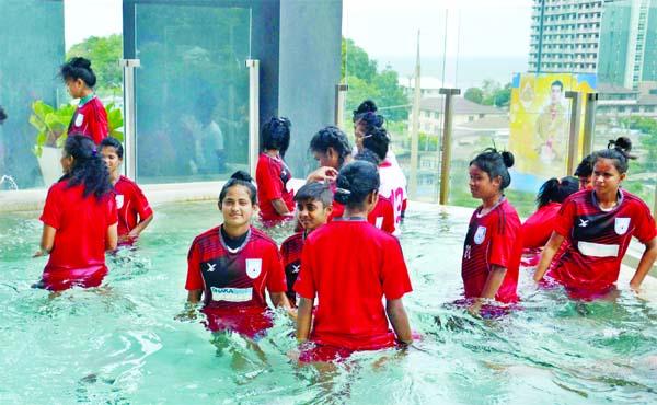 Members of Bangladesh Under-16 Women's Football team during their practice session at the swimming pool in Chonburi, Thailand on Friday.