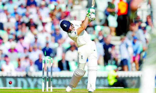 England's Jos Buttler is bowled by Australia's Pat Cummins during the second day of the 5th Ashes Test between Australia and England at the Oval in England on Friday.