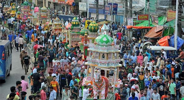 A view of the Tazia procession brought out from Sadarghat area in the city on Tuesday .