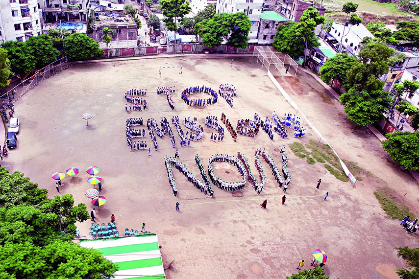 Students formed a big display with a call to stop greenhouse gas emissions ahead on the UN Climate Summit to be held in New York on 23 September. This photo was taken from city's Rayer Bazar Boishakhi play-ground on Saturday.