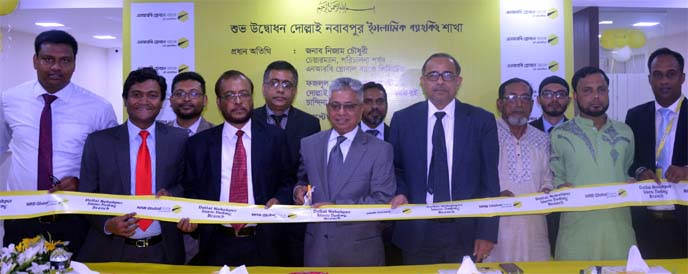 Nizam Chowdhury, Chairman of NRB Global Bank Limited, inaugurating its Islami Banking Branch operations at Dollai Nawabpur in Comilla recently. Syed Habib Hasnat, Managing Director, Md. Mostafizur Rahman Siddiquee, AMD, other senior officials of the bank