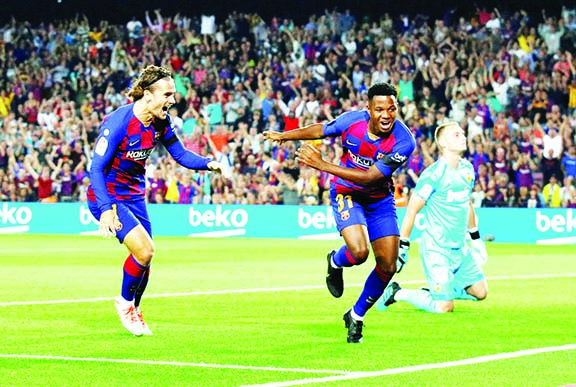 Barcelona's Anssumane Fati (right) celebrates scoring with Antoine Griezmann (left) during their La Liga Santander match at Camp Nou, Barcelona, Spain on Saturday.