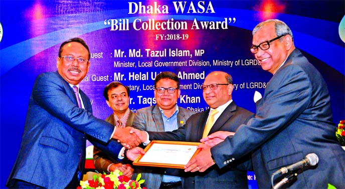 Md. Quamrul Islam Chowdhury, CEO of Mercantile Bank Limited, receiving the 'Bill Collection Award' as one of the top bill collector bank among 33 banks in collecting Dhaka WASA's bill in fiscal year 2018-19 from LGRD & Cooperatives Minister Md. Tazul I