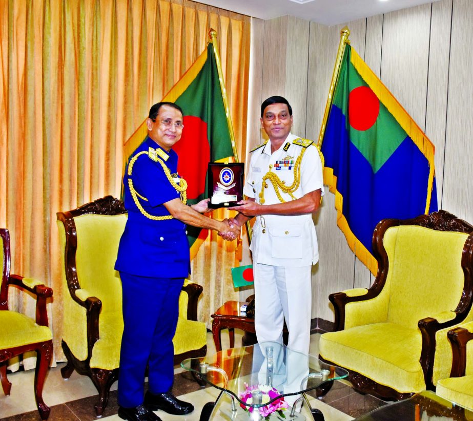 Director General of Indian Coastguard Krishnaswamy Natarajan being greeted with a crest by his Bangladesh counterpart Rear Admiral M Ashraful Haque at the Headquarters of Bangladesh Coastguard in the city on Monday.