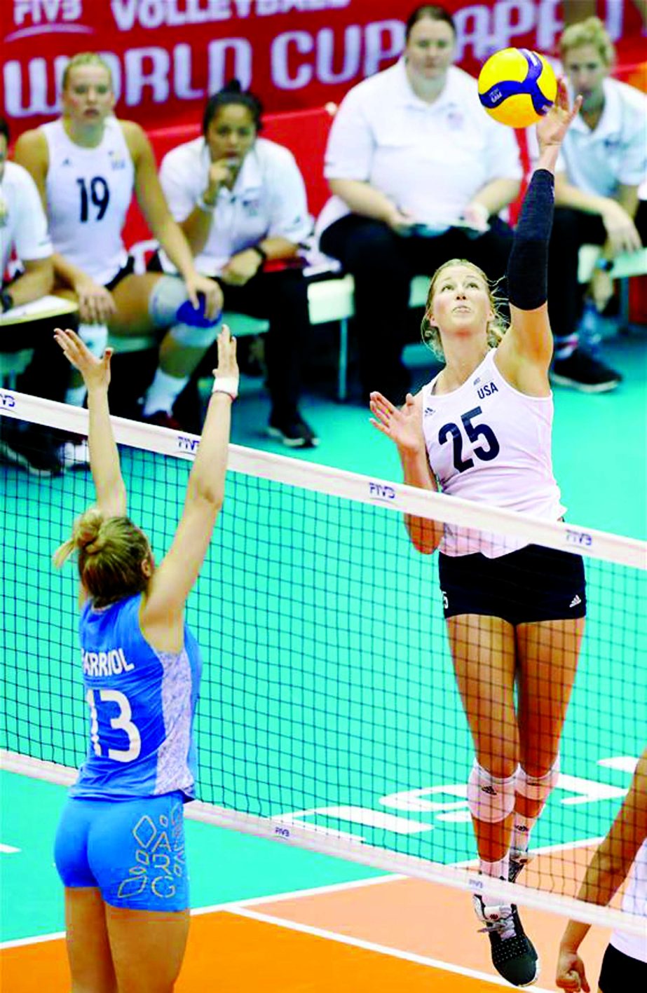 Karsta Lowe (right) of the United States spikes the ball during the Robin Round match between the United States and Argentina at 2019 Volleyball Women's World Cup in Hamamatsu, Japan on Monday.
