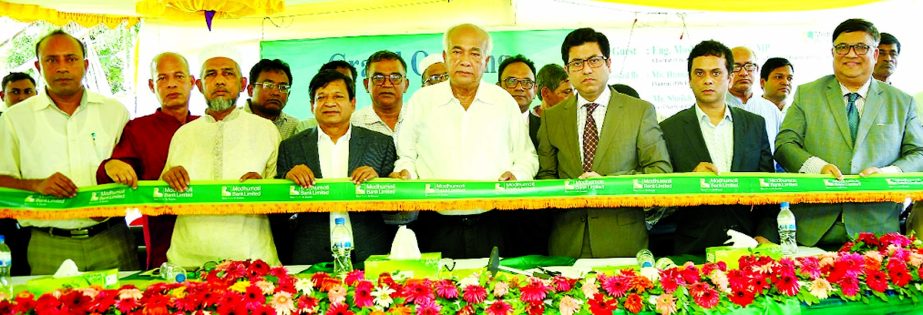 Eng. Mosharraf Hossain, MP, Chairman of the Parliamentary Standing Committee on the Ministry of Housing and Public Works, inaugurating the 38th branch of Modhumoti Bank Limited at Mirsharai in Chattogram on Tuesday as chief guest. Barrister Sheikh Fazle N