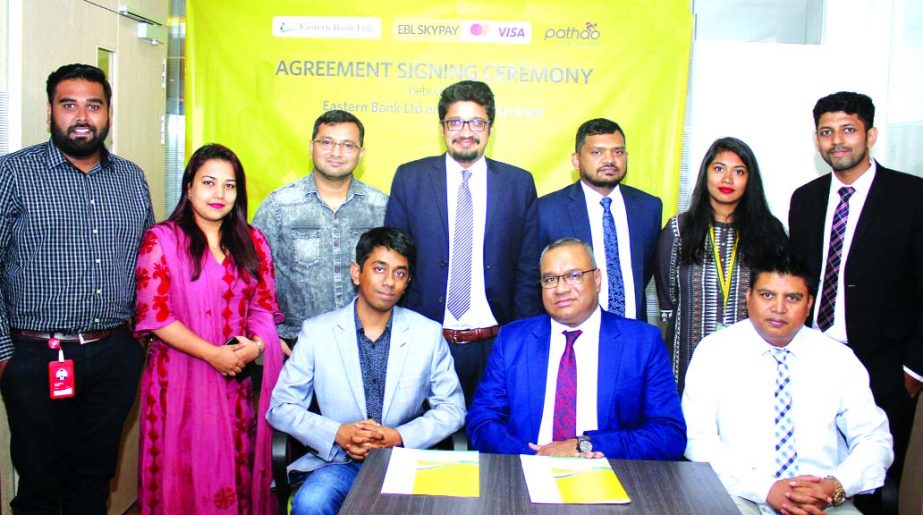 M. Khorshed Anowar, Head of Retail and SME Banking of Eastern Bank Limited (EBL) and Hussain M. Elius, CEO of Pathao Limited, poses for photograph after signed an agreement at the bank's head office in the city recently. Under the deal, users of Pathao s