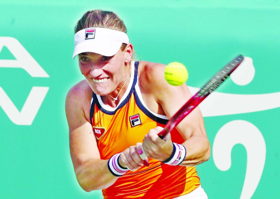 Timea Babos of Hungary, returns a shot to Karolina Muchova of the Czech Republic, during their second round match of the Korea Open tennis championships in Seoul, South Korea on Thursday.