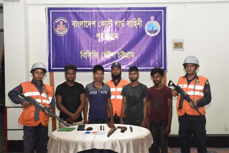 Members of Coast Guard arrested four persons with arms from Kornophuli Thana on Tuesday.
