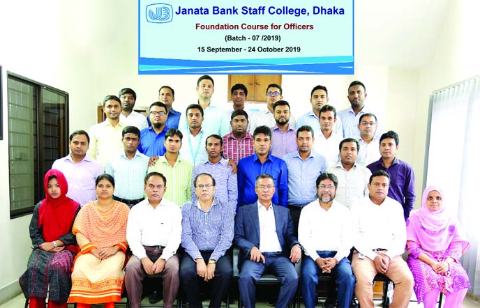 Managing Director and CEO of Janata Bank Limited (JBL) Md Abdus Salam Azad poses with the participants of the Foundation Course for Officers at JBL Staff College in the capital recently. Principal of the bank's staff college (Dhaka) and General Manager K