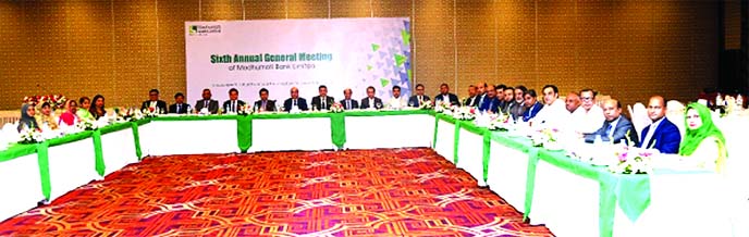 Humayun Kabir, Chairman, Board of Directors of Modhumoti Bank Limited, presiding over its 6thAGM in a city hotel recently. The AGM approved 10 per cent cash and five per cent Stock Dividend for the year 2018. Shaikh Salahuddin, M.P, Vice-Chairman, Barrist