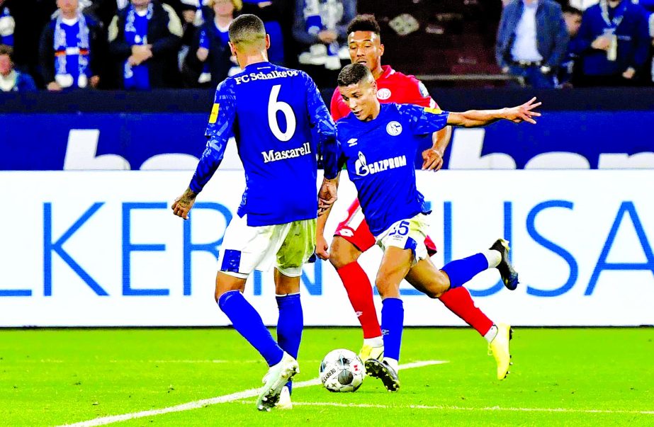 Schalke's Amine Harit scores the final decisive goal during the German Bundesliga soccer match between FC Schalke 04 and FSV Mainz 05 in the arena in Gelsenkirchen, Germany on Friday.