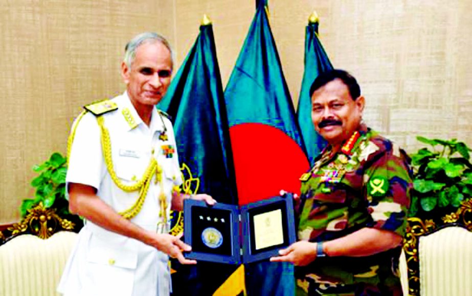 Indian Chief of Navy Staff Admiral Karambir Singh made a courtesy call on Chief of Army Staff of Bangladesh General Aziz Ahmed at Army Headquarters yesterday. Photo : ISPR