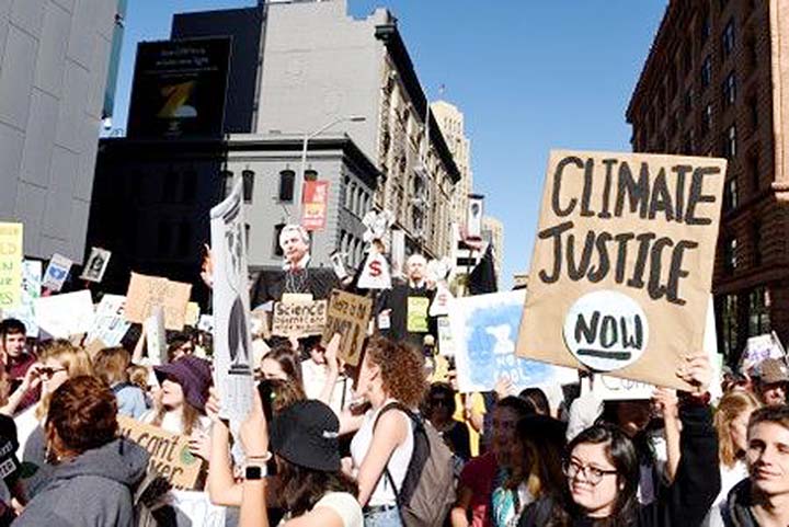 Young people protest outside of the San Francisco Federal Building during a Climate Strike march in San Francisco.