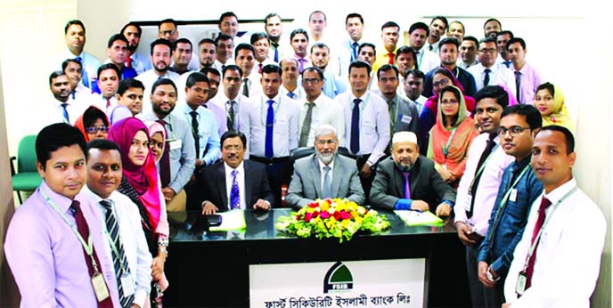 Md. Zahurul Haque, DMD of First Security Islami Bank Limited, poses for photograph with the participants of a 5-day long training program on 'Investment Procedure' at its regional training institute in Chattogram on Sunday. High officials of the bank we