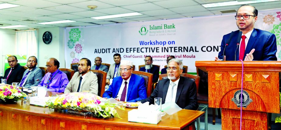 Mohammed Monirul Moula, Managing Director of Islami Bank Bangladesh Limited, speaking at a workshop on "Audit and Effective Internal Control" at the bankâ€™s head office in the city on Monday. JQM Habibullah, Taher Ahmed Chowdhury and Md. Saleh Iqb
