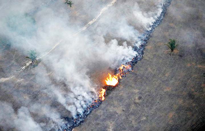 An aerial view shows a fire in an area of the Amazon rainforest near Porto Velho, Rondonia State, Brazil.