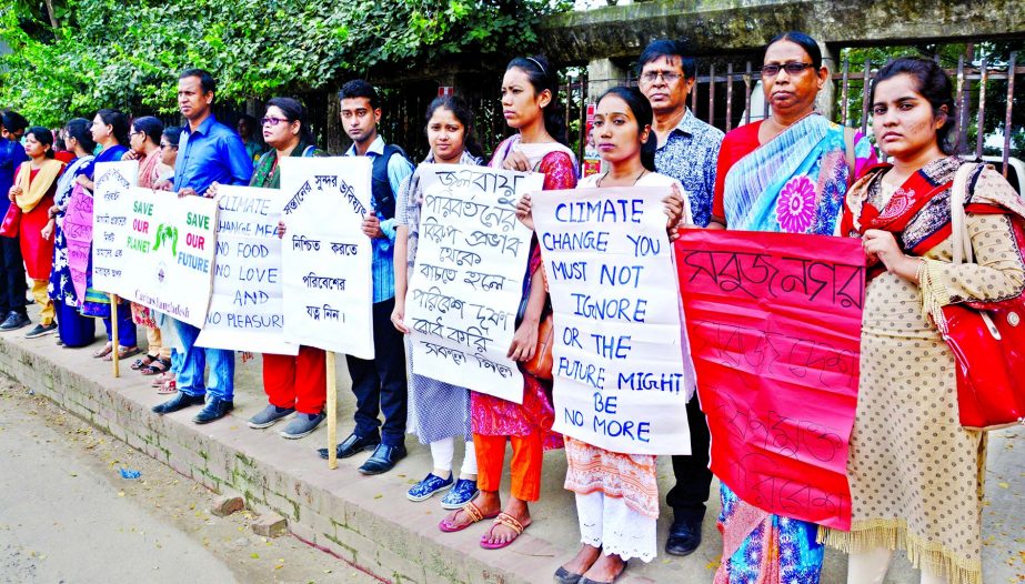 Caritas Bangladesh formed a human chain in front of Jatiya Press Club on Tuesday with a call to make environment free from pollution.