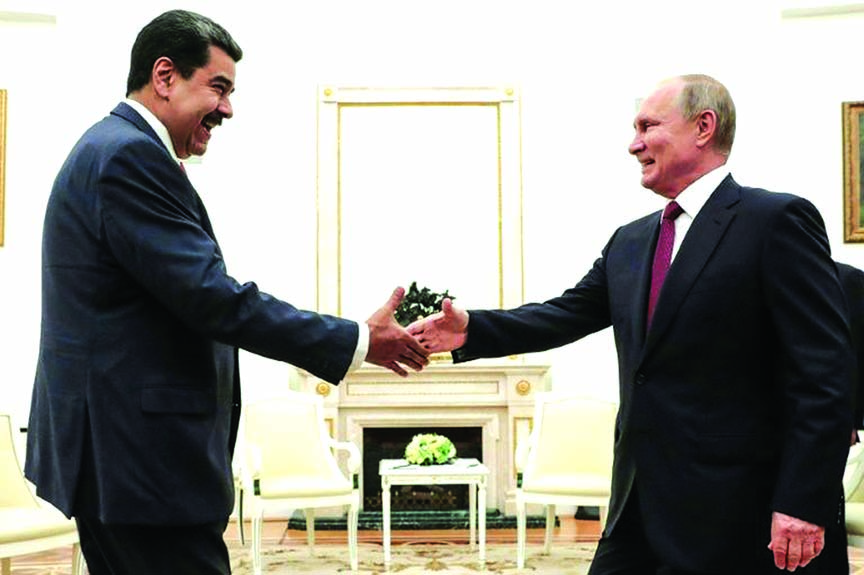 Russian President Vladimir Putin welcomed embattled Venezuelan President Nicolas Maduro to the Kremlin urging dialogue with the opposition.