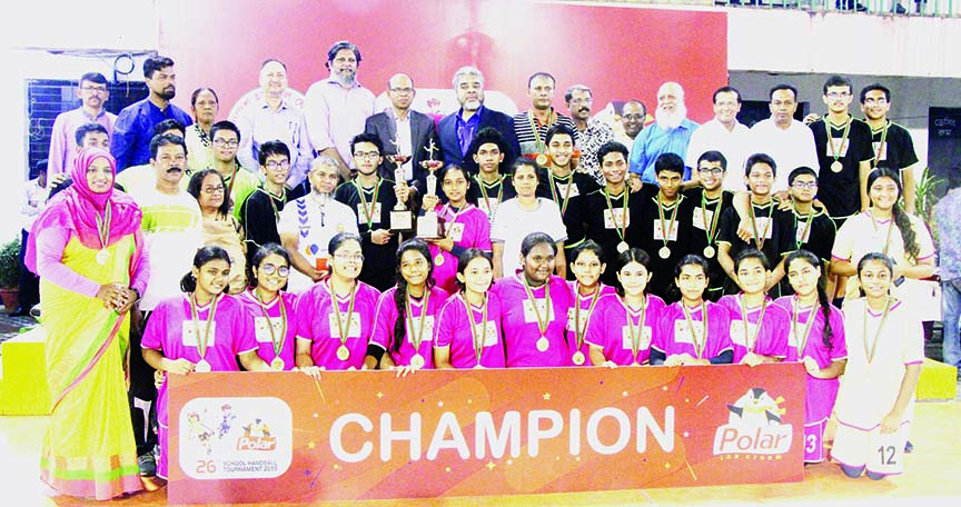 Viqarunnisa Noon School & College, the champions in the Girls' Group and SunnyDale, the champions in the Boys' Group of the Polar Ice Cream 26th School Handball Tournament with the guests and the officials of Bangladesh Handball Federation pose for a ph