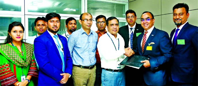 Md. Habibur Rahman, General Manager of Agricultural Credit Department of Bangladesh Bank (BB) and Syed Mahbubur Rahman, CEO of Dhaka Bank Limited, exchanging an agreement signing document to ensure fair price for local jute growers under BBs refinance sch
