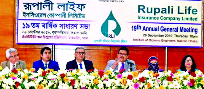 Mahfuzur Rahman, M.P, Chairman of Rupali Life Insurance Company Limited, presiding over its 19th AGM a IDE,B auditorium in the city on Thursday. The AGM approved 12 cash share for the shareholders. Top executives of the company were also present.