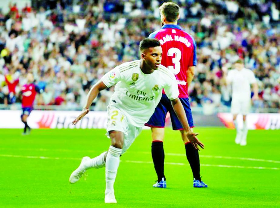Real Madrid's Rodrygo celebrates scoring their second goal against Osasuna at the Santiago Bernabeu stadium in Madrid on Wednesday.