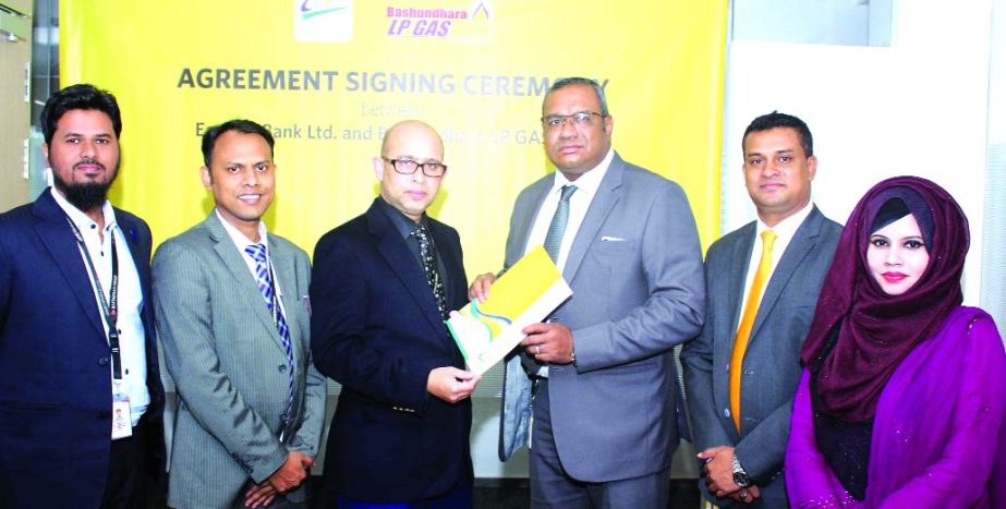 ZM Ahmed Prince, Head of Business Development and Marketing of Bashundhara LP Gas and M Khorshed Anwar, Head of Retail and SME Banking of Eastern Bank Limited (EBL), exchanging an agreement signing document at the bank's head office in the city on Thursd