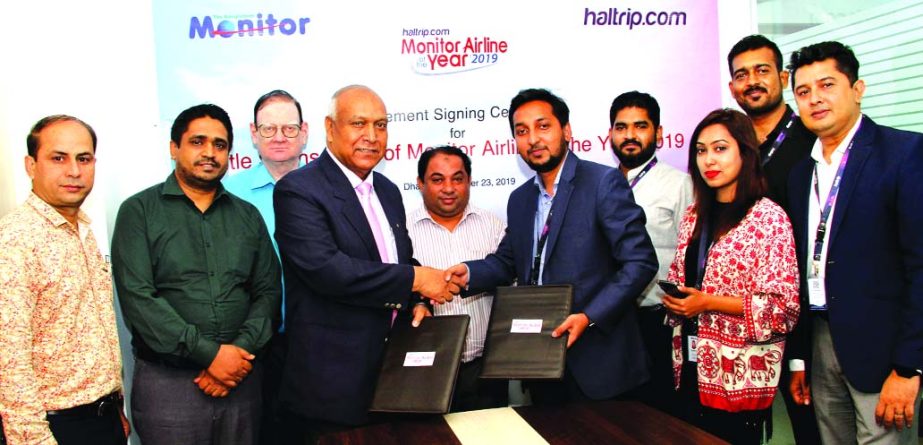 Kazi Wahidul Alam, Editor of the Bangladesh Monitor and Tajbir Hasan, Managing Director of Haltrip, exchanging documents after signing a sponsorship deal in the city recently. Under the agreement, Haltrip will support the Monitor Airline of the Year 2019,