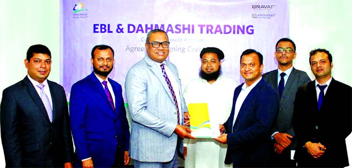 M. Khorshed Anowar, Head of Retail and SME Banking of Eastern Bank Limited (EBL) and Farhad Mostofa Chowdhury, CEO of Dahmashi Trading Company Limited (sole distributor of BRAVAT and NANOGRESS products), exchanging an agreement signing documents at the ba