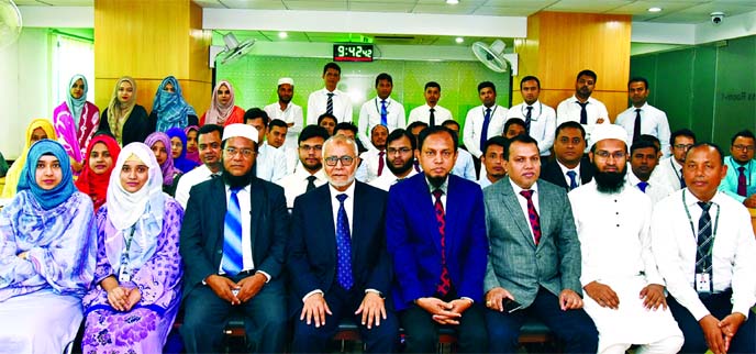 Md. Fazlul Karim, Managing Director (CC) of Al-Arafah Islami Bank Limited, poses for photograph with the participants of a 3 Day-long training course on 'Capacity Development of General Banking Officials' at its Training and Research Institute in the ci