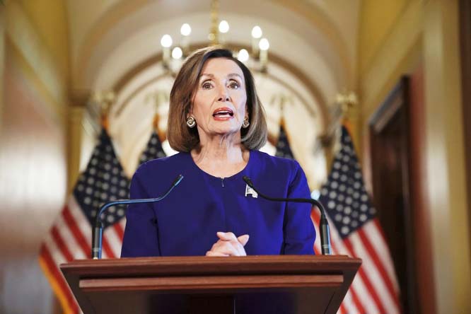 House Speaker Nancy Pelosi of Calif., reads a statement announcing a formal impeachment inquiry into President Donald Trump on Capitol Hill in Washington on Tuesday