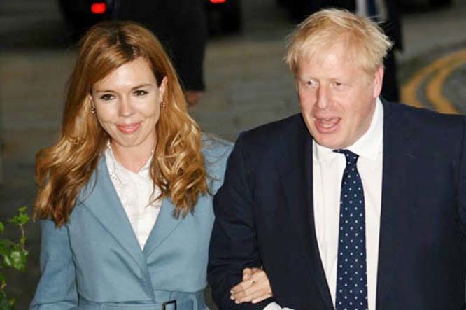 Boris Johnson arrived in Manchester for the Conservative party conference with his partner Carrie Symonds.