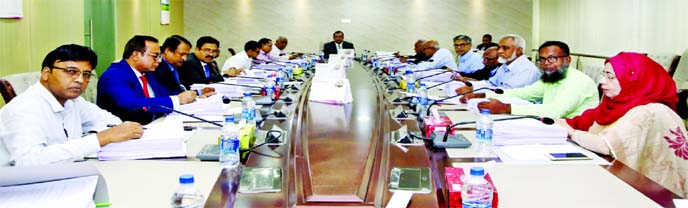 S M Amzad Hossain, Chairman of South Bangla Agriculture & Commerce (SBAC) Bank Limited, presiding over the 95th Board of Directors Meeting of the Bank on Sunday at the bank's Head Office in the city. Managing Director Md Golam Faruque was also present.