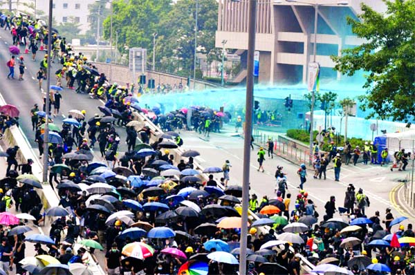 The most intense clashes in weeks as police used sustained rounds of teargas, rubber bullets and water cannon at multiple locations in Hong Kong on Sunday.