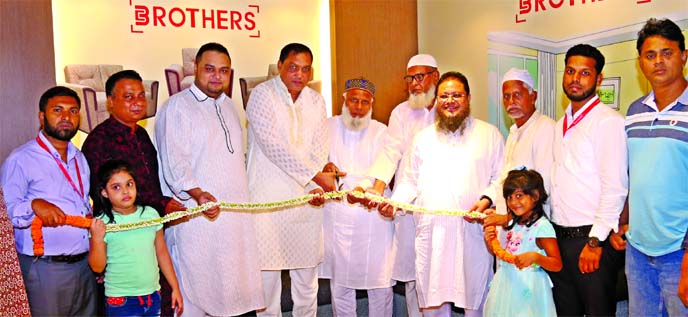 Elias Sarker, Managing Director of Brothers' Furniture, launching a showroom at Khilgaon in the city recently. Director Sharifuzzaman Sarker and Head of Marketing and Sales Mohammad Monirul Islam Bokshi, among others, were present.