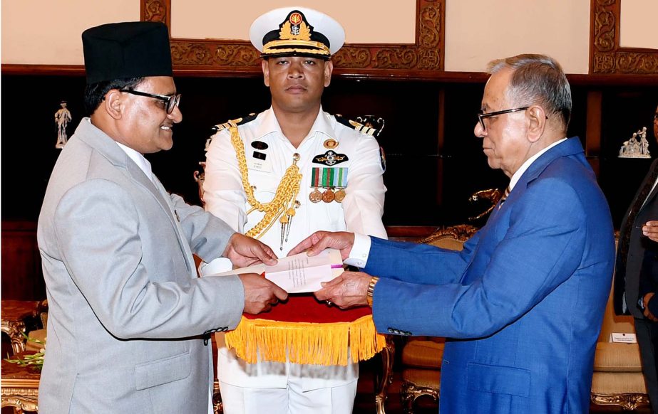 Newly appointed Nepalese Envoy to Bangladesh Dr. Banshidhar Mashra presenting his credentials to President Abdul Hamid at Bangabhaban on Monday. Press Wing, Bangabhaban photo