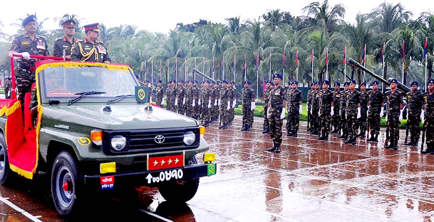 Chief of Army Staff of Bangladesh General Aziz Ahmed giving Regimental colour among the four Golandaz Units at Artillery Centre and School in Halishahar as Chief Guest yesterday. ISPR photo