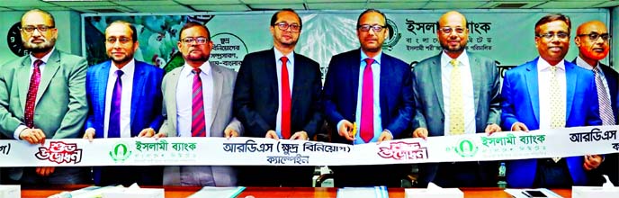 Md. Mahbub ul Alam, CEO of Islami Bank Bangladesh Limited, inaugurating its Rural Development Scheme (Small Investment) Campaign at the bank's head office in the city on Tuesday. Mohammed Monirul Moula, AMD, Abu Reza Md. Yeahia, Md. Saleh Iqbal, DMDs and