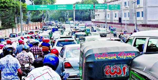 The city witnessed massive traffic congestion on Wednesday causing untold sufferings to the commuters. This photo shows that thousands of vehicles got stuck at Kakrail intersection ensuing a long-tailback.
