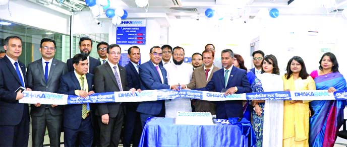 Syed Mahbubur Rahman, Managing Director of Dhaka Bank Limited, inaugurating its Banking Booth at city's Hatirpool area recently. Sakir Amin Chowdhury, DMD and other senior officials of the bank were also present.