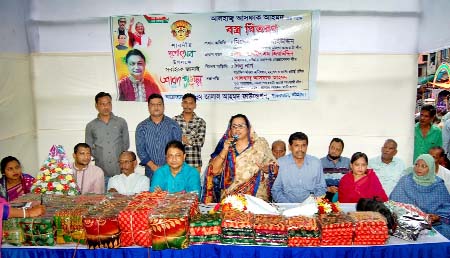 Hasina Mohiuddin, President, Chattogram Mahila Awami League speaking at a clothes distribution programme organised by Jalal Ahmed Foundation at Patharghata recently.