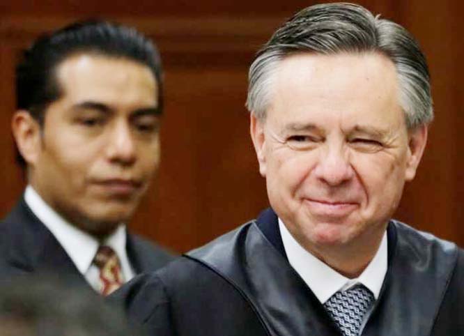 Mexico's new Supreme Court judge Eduardo Medina Mora Â® arrives to attend an official welcoming ceremony for him at the Supreme Court building in Mexico City.