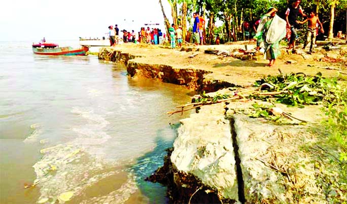 A severe erosion took place on the banks of the River Padma in Daulatdia and Debogram Unions of Goalando upazila under Rajbari district as on rush water from upstream threatening the existence of Daulatdia ferry and launch ghats. This photo was taken on F