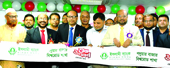 Md. Mahbub ul Alam, CEO of Islami Bank Bangladesh Limited, inaugurating its 347th Branch at Paduar Bazar Biswa Road in Cumilla on Thursday. Abu Reza Md. Yeahia, DMD, Md. Mosharraf Hossain, SEVP, Md. Mizanur Rahman Bhuiyan, SVP of the bank and local elites