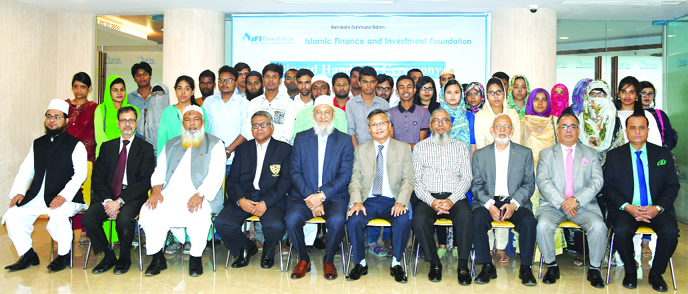SM Bakhtiar Alam, Chairman of Islamic Finance and Investment Foundation, poses for a photograph with the stipend recipients of the foundation at a ceremony at head office of the company recently. A total of 33 students of various public and private univer